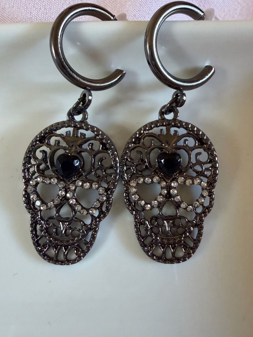 Gunmetal Filigree Skull Drop Earrings with Black Heart Accent